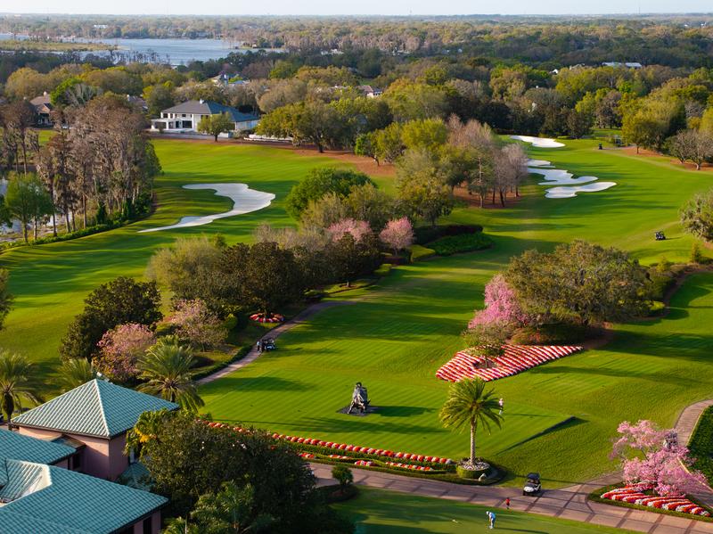 Fairway lined with blooming spring trees — Isleworth Golf and Country Club, Windermere FL