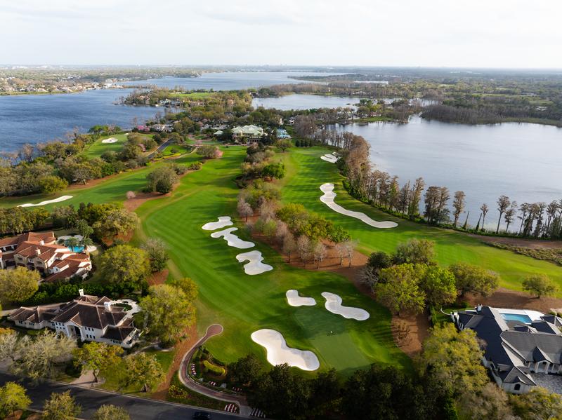 Lakeside holes with white sand bunkers — Isleworth Golf and Country Club, Windermere FL