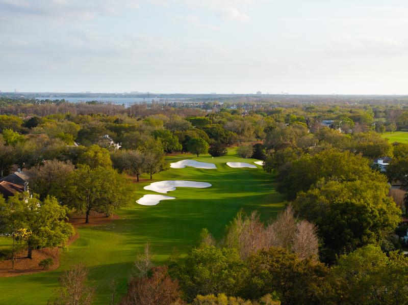 Tree-lined fairway with layered bunkers — Isleworth Golf and Country Club, Windermere FL