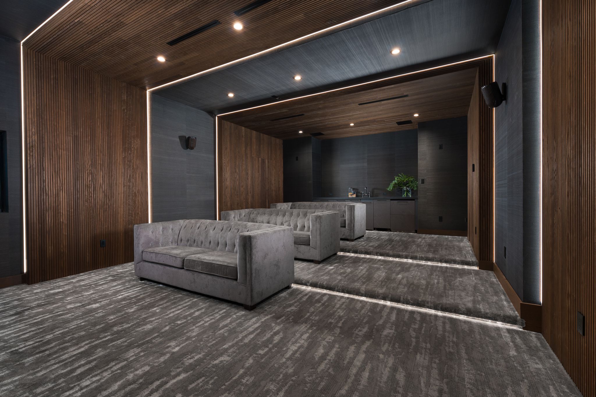 Home theater with acoustic wood paneling — The New American Home 2026, Orlando FL