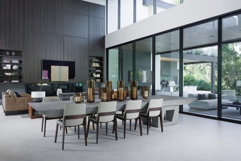 Dining room with floor-to-ceiling glass walls — The New American Home 2026, Orlando FL