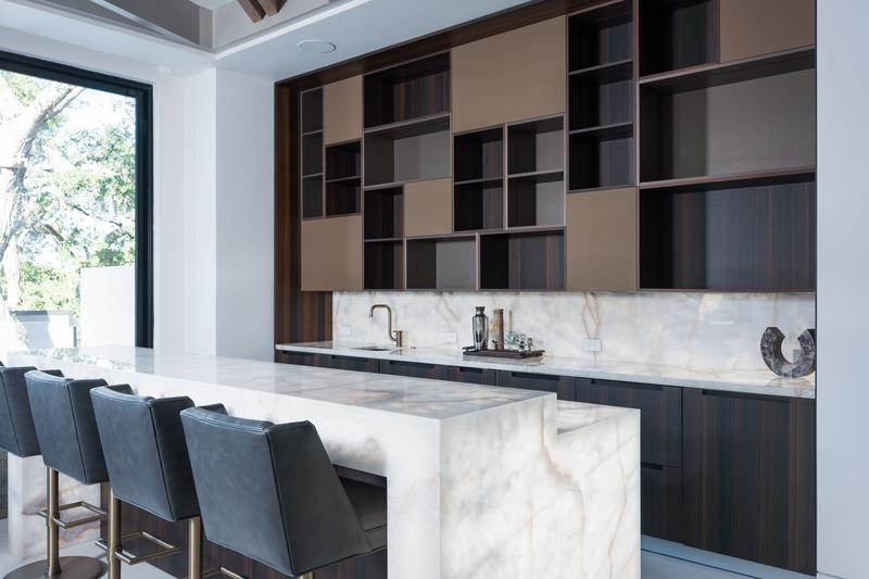 Bar with marble counters and display shelving — The New American Home 2026, Orlando FL