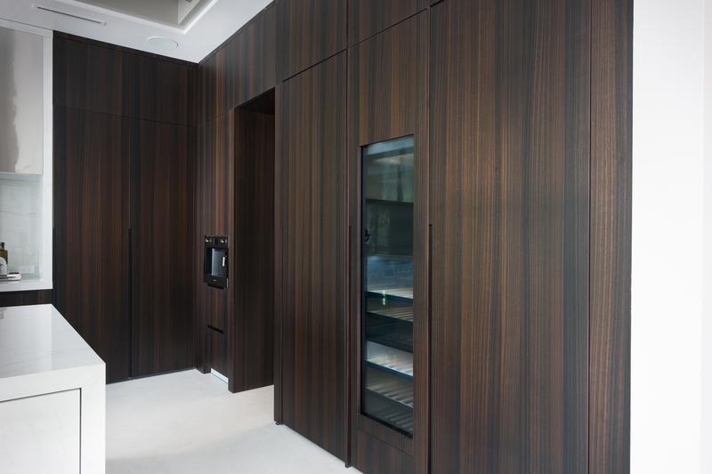 Butler's pantry with dark wood cabinetry — The New American Home 2026, Orlando FL