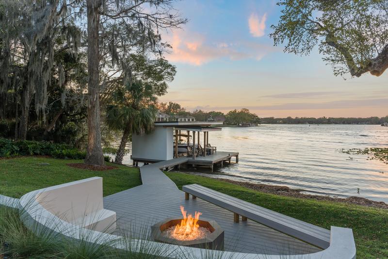 Lakefront fire pit and dock at sunset — The New American Home 2026, Orlando FL