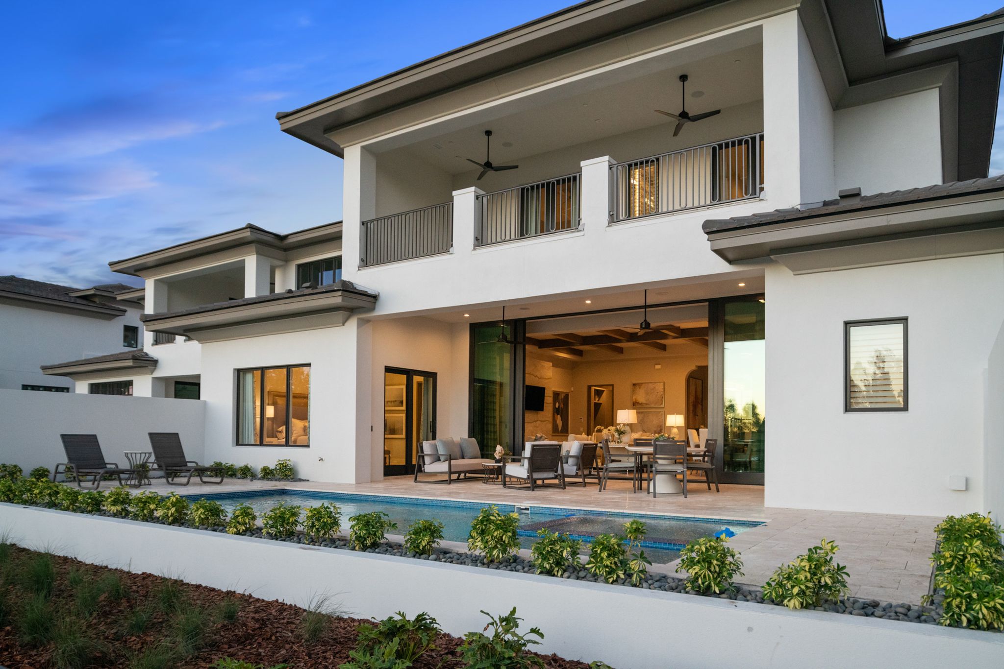 Model residence rear exterior with covered lanai — Ritz-Carlton Residences at Grande Lakes, Orlando FL