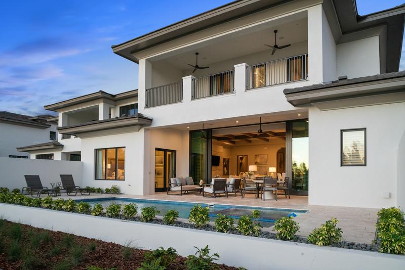 Model residence rear exterior with covered lanai — Ritz-Carlton Residences at Grande Lakes, Orlando FL