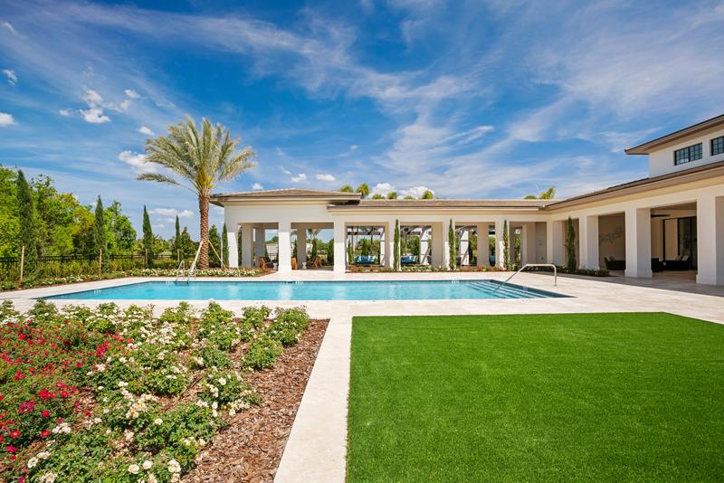 Amenity lawn and resort-style pool — Ritz-Carlton Residences at Grande Lakes, Orlando FL