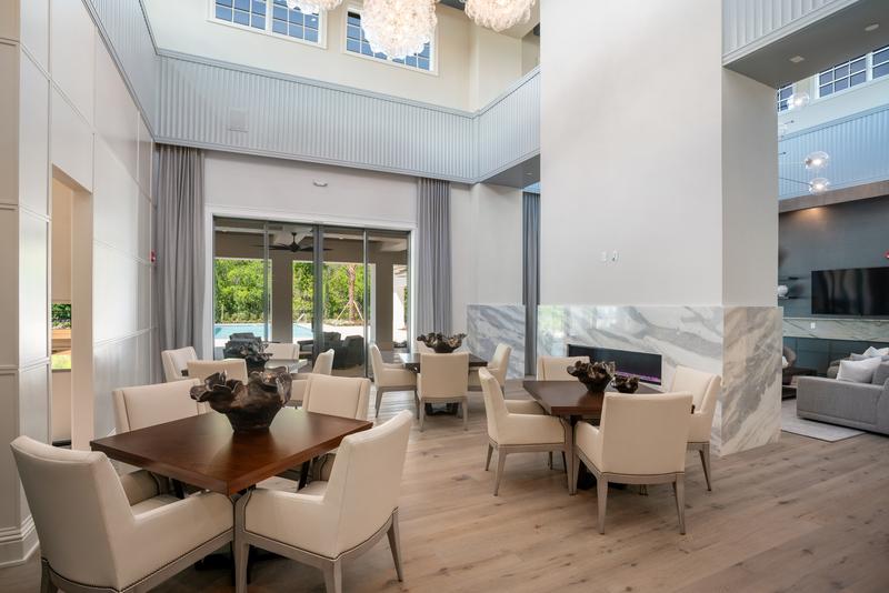 Clubhouse dining area with fireplace — Ritz-Carlton Residences at Grande Lakes, Orlando FL