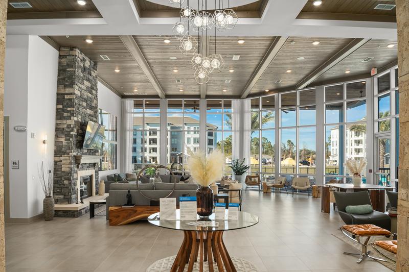 Clubhouse great room with stone fireplace — Sanctuary at Daytona apartments, Daytona Beach FL