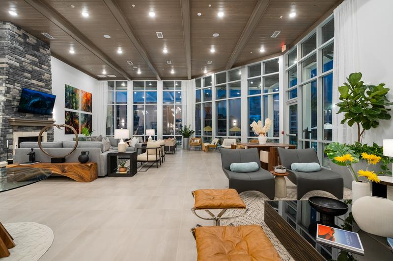 Clubhouse interior lit at dusk — Sanctuary at Daytona apartments, Daytona Beach FL
